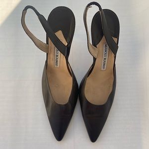 Brown Manolo Blahnik slingbacks.